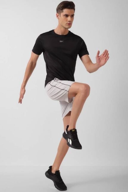 REEBOK   Men Solid Round Neck Polyester Black T-Shirt