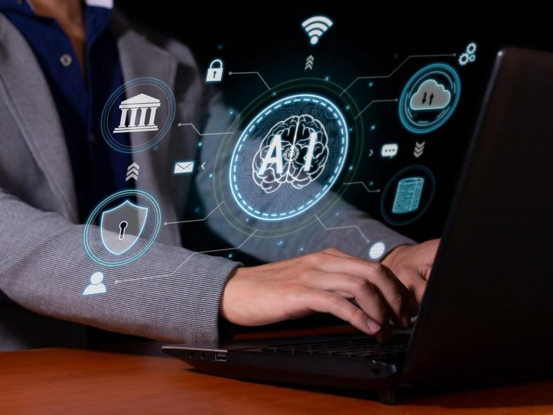 a-man-interacts-with-artificial-intelligence-to-optimize-and-automate-computing-.jpg